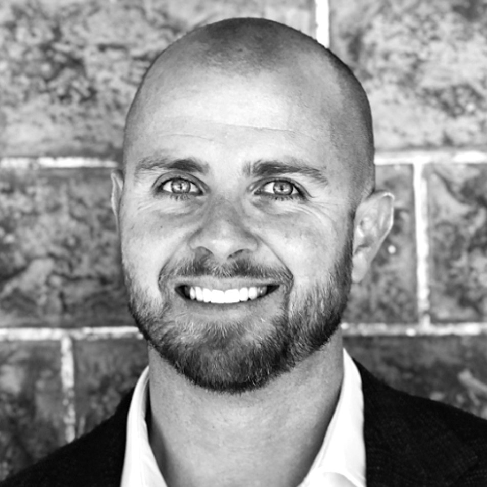 A professional portrait of Chris Kerrisk, Co-founder